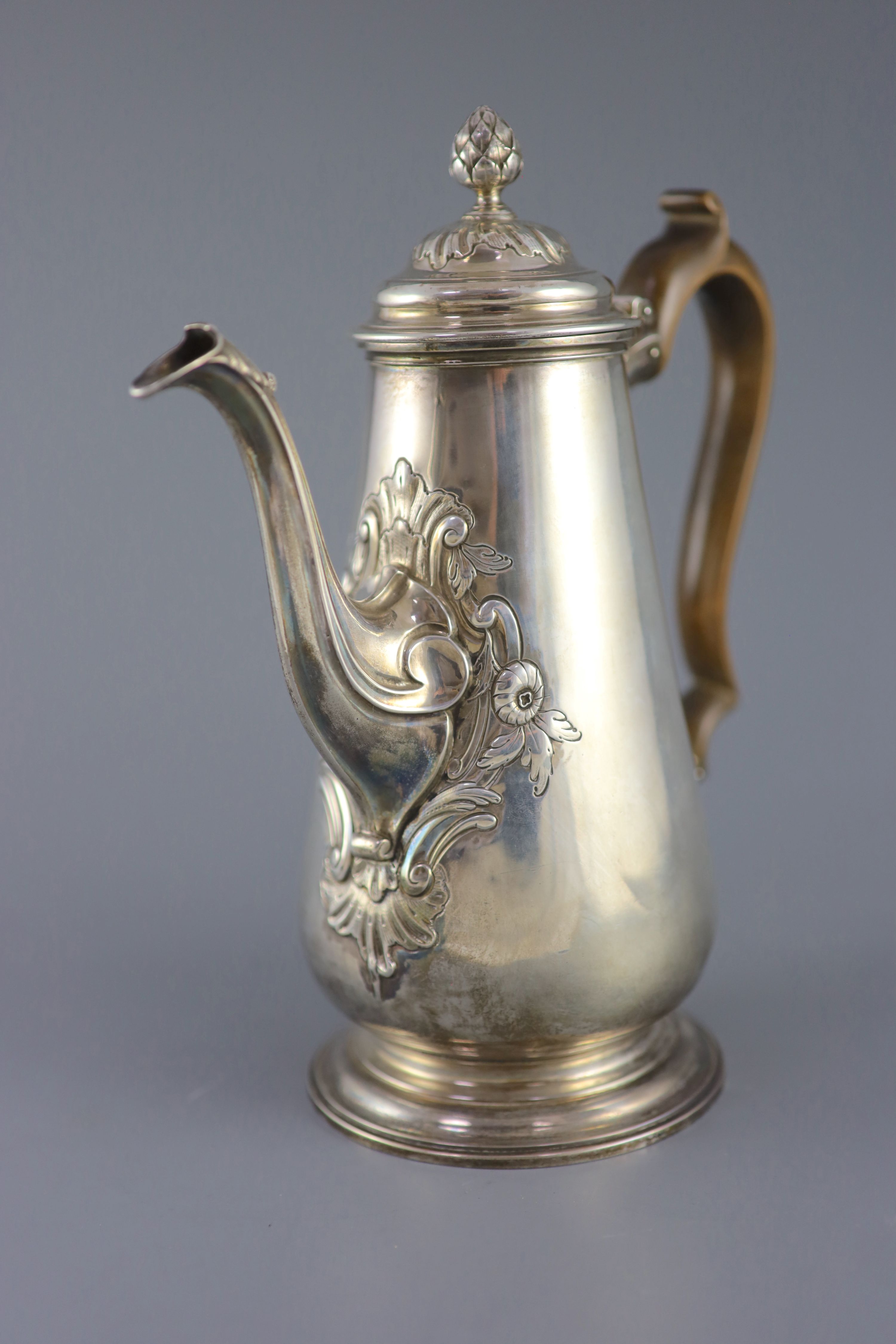 A George II silver coffee pot by Alexander Johnston